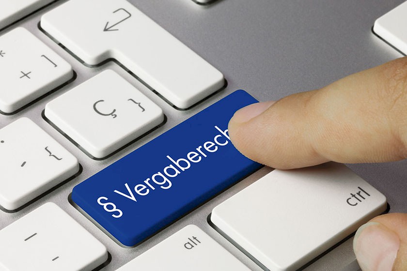 Finger auf Taste für Informationen zum Vergaberecht